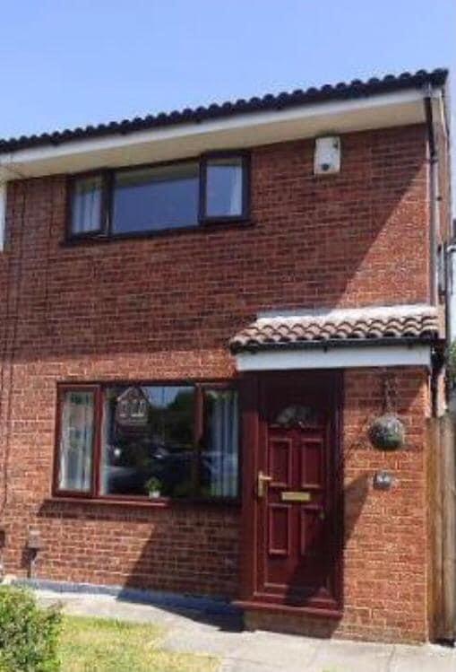 Old brown UPVC frames and door 