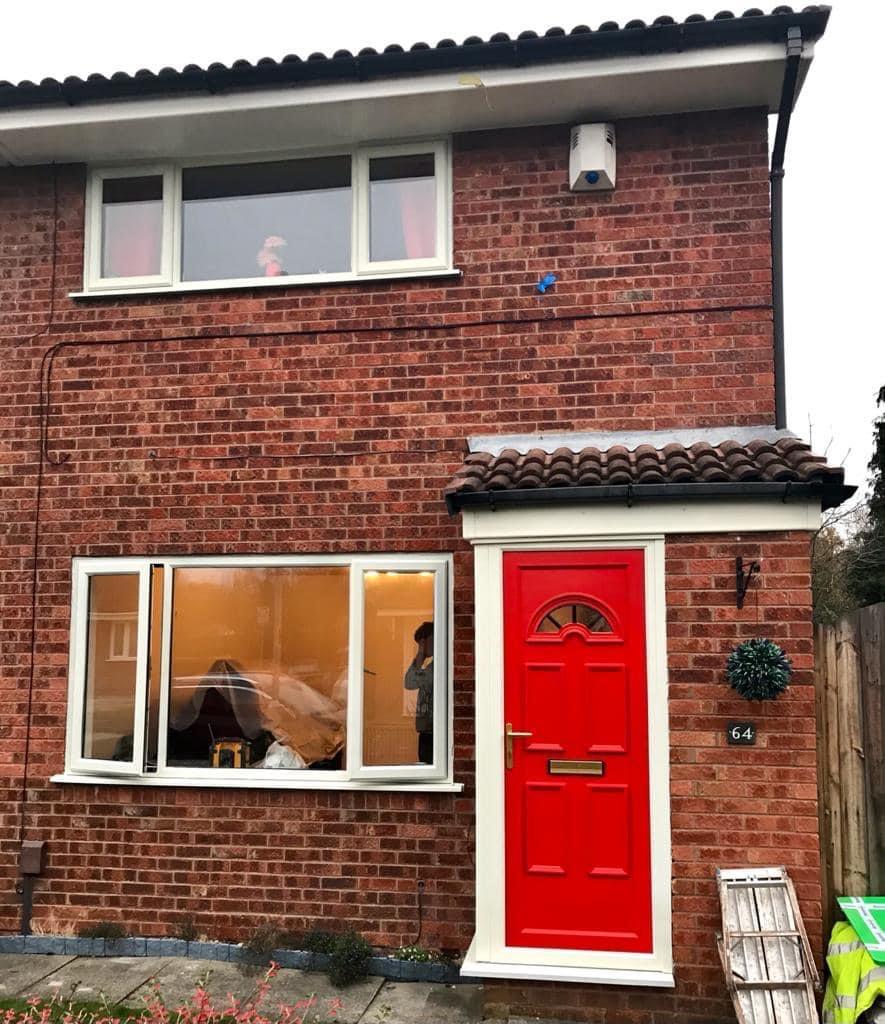 UPVC white frames and red UPVC door